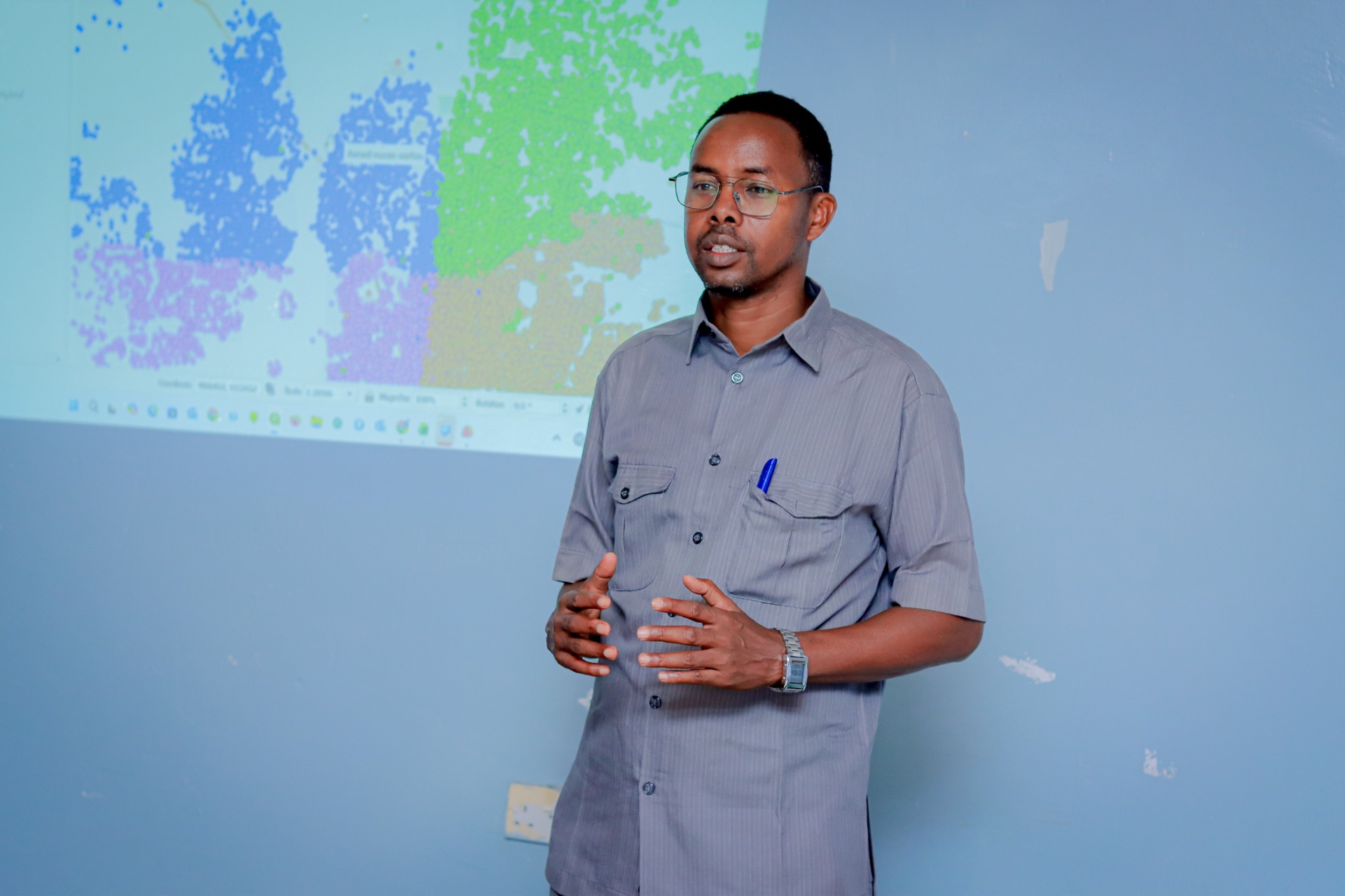 Facilitator demonstrating a property and revenue dashboard during the training