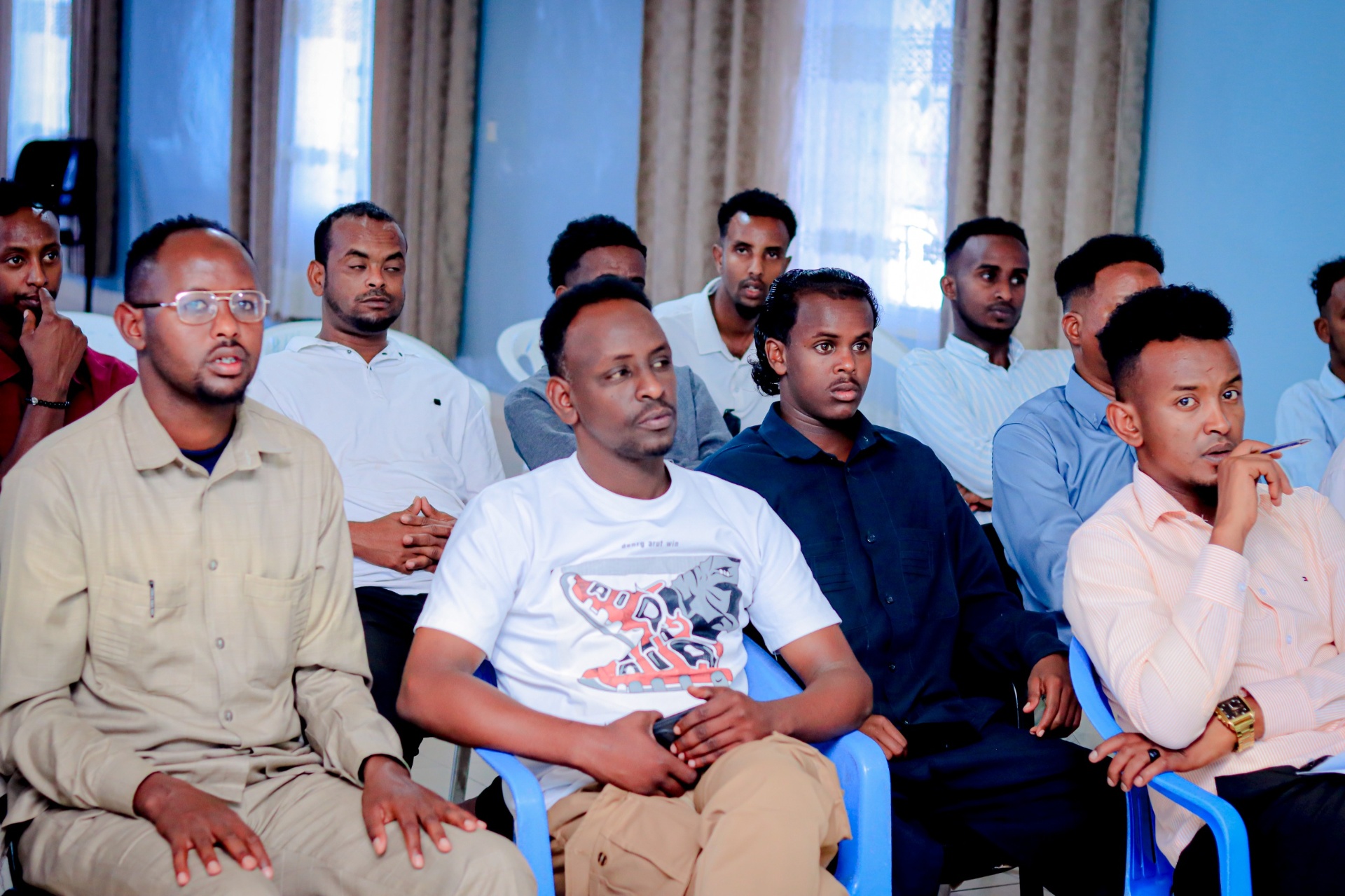 Borama Taxation Department staff listening attentively during the workshop